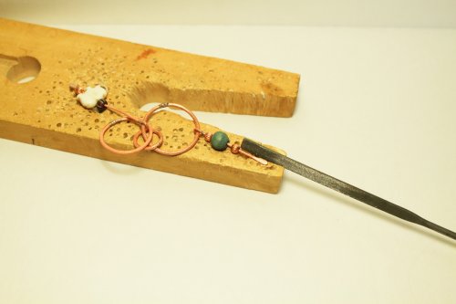 Judy Freyer Thompson's Circle Earrings Take 2 - , Contemporary Wire Jewelry, Dapping, Dapping Jewelry, Loops, Wire Loop, Wrapped Wire Loop, Beads, Lay the paddled ends on the bench